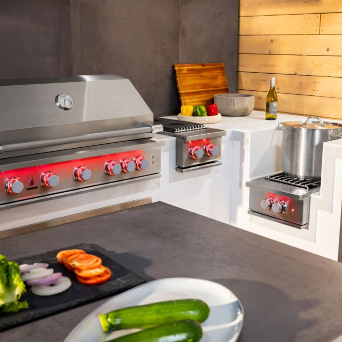 TrueFlame outdoor kitchen with stainless steel built-in grill, side burner and power burner
