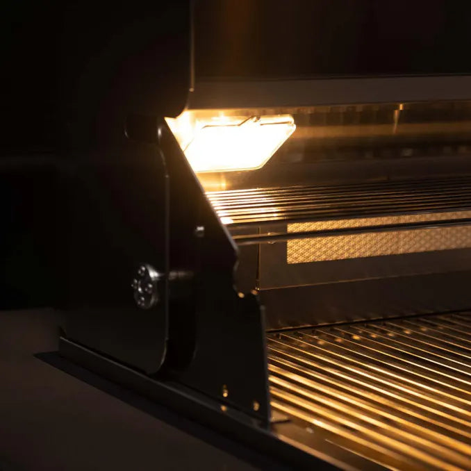 Interior halogen lighting inside TrueFlame 40-Inch outdoor gas grill